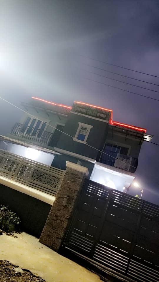 Angled view of the hotel exterior at night