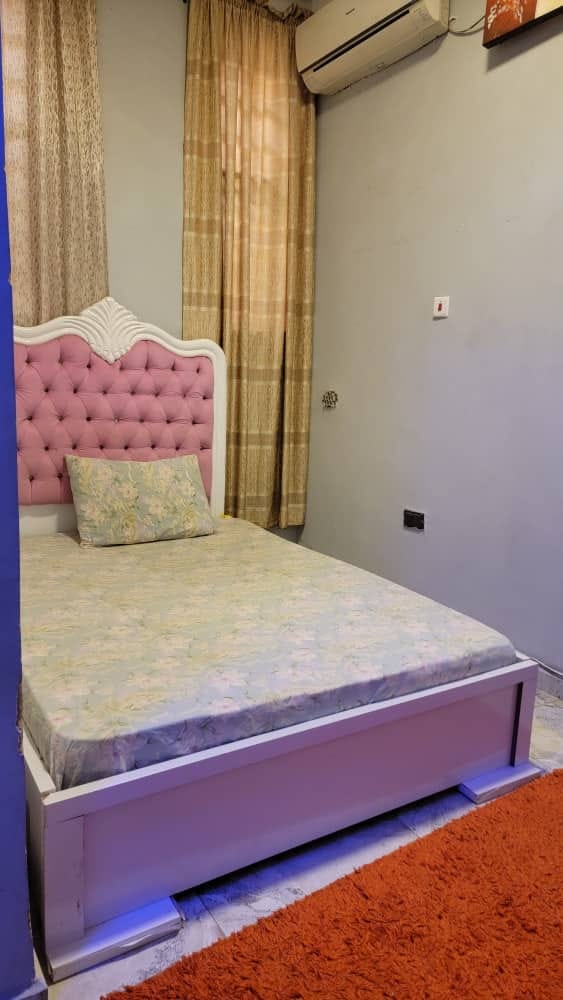 Side view of a furnished single room